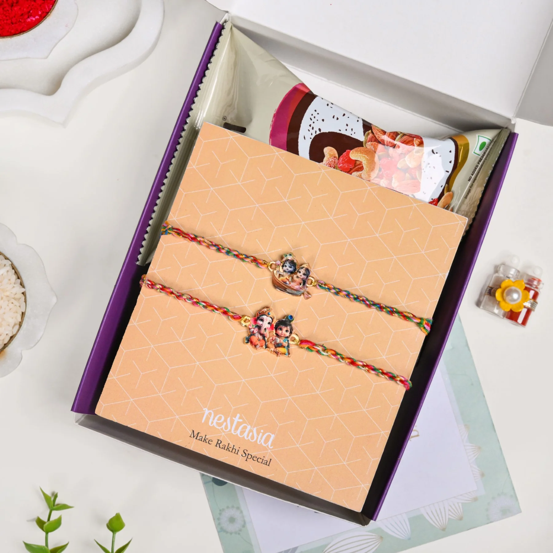 Radha Krishna And Ganesh Krishna Rakhi Gift Set - Image 5