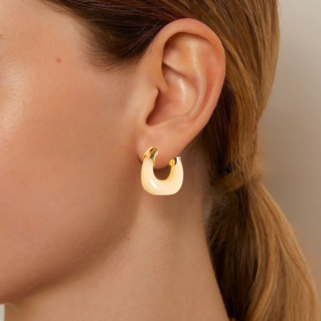 White And Gold Huggie Hoop Earrings - Image 2